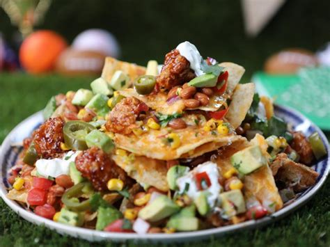 Layer half the chips, cheddar, cotija, chicken, pickled jalapeños, and onion. Loaded Barbecue Chicken Nachos Recipe | Food Network ...