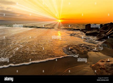Ocean Sunrise Sun Rays Is A Colorful Ocean Scenic With Sun Beams