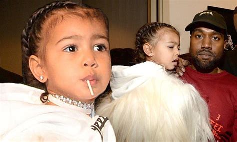 kanye west cuddles daughter north at his yeezy season three nyfw fashion show daily mail online