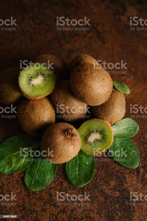 Fresh Whole And Cut Kiwis Stock Photo Download Image Now