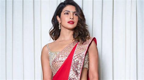 Priyanka Chopras Red Abu Jani Sandeep Khosla Sari Came With A Sexy Strappy Mirror Work Blouse