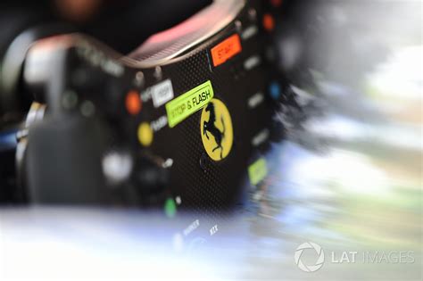 The buttons on the t300 gte steering wheel are blue and red. Ferrari 488 GTE steering wheel detail at 24 Hours of Le Mans