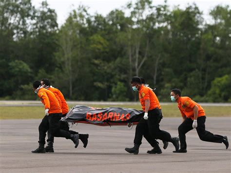 Airasia Flight Qz8501 Crash Body Recovered Wearing Life Jacket As Sonar Image Appears To Show