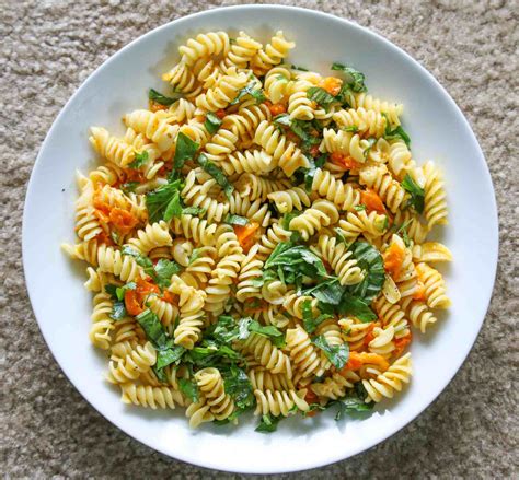 Fusilli Pasta With Cherry Tomatoes Basil Leaves By Archana S Kitchen