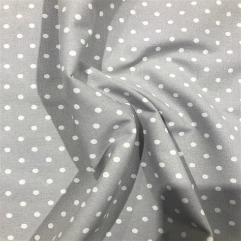 Grey Polka Dot Print Canvas Fabric On Navy Blue Fabric