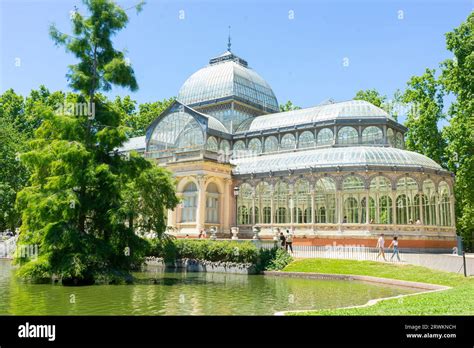 Sunlight through glass, nature's embrace. Marvel at Madrid's shimmering