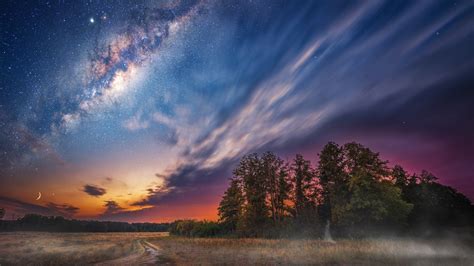 Download Wallpaper 1366x768 Milky Way Clouds Night Sky Landscape