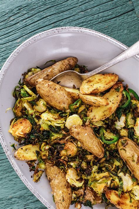 sunny anderson s spicy roasted potatoes and brussels sprouts recipe veggie dishes