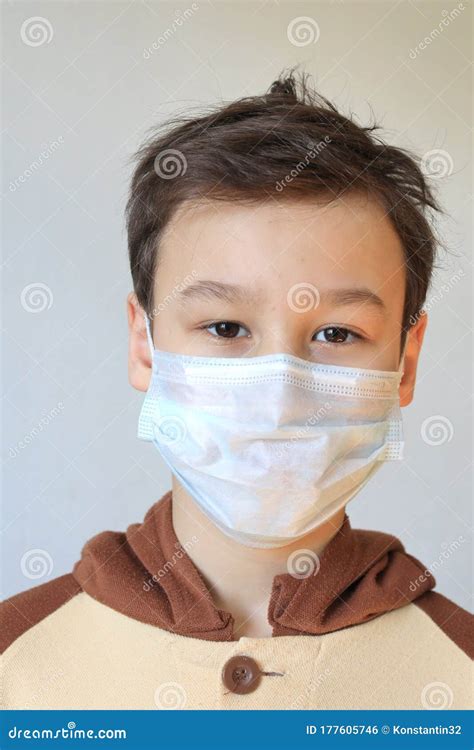 Close Up Of Young Boy Wearing Mask Stock Photo Image Of Medical