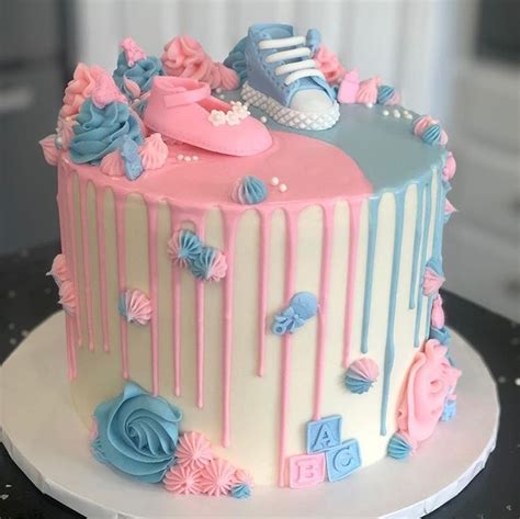 steph and roxie on instagram “gender reveal cake and cupcakes really cute eh