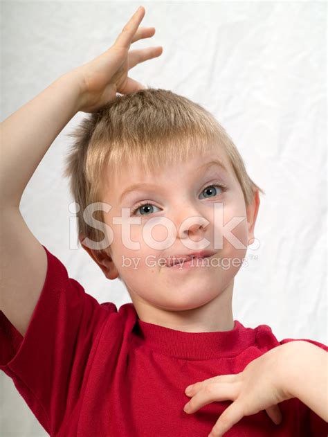 Young Boy Making A Funny Face Stock Photos