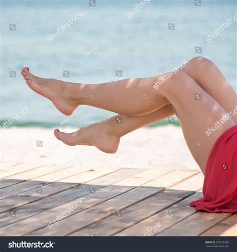 Womans Beautiful Legs On Beach Stock Photo 579218188 Shutterstock