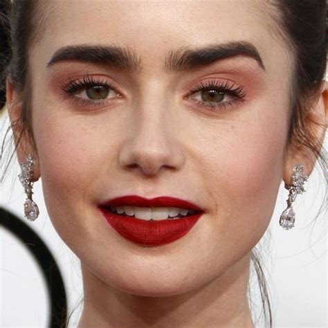 Lily Collins Makeup Black Eyeshadow Brown Eyeshadow And Red Lipstick