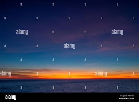 Dusk Over Sea Stock Photo Alamy