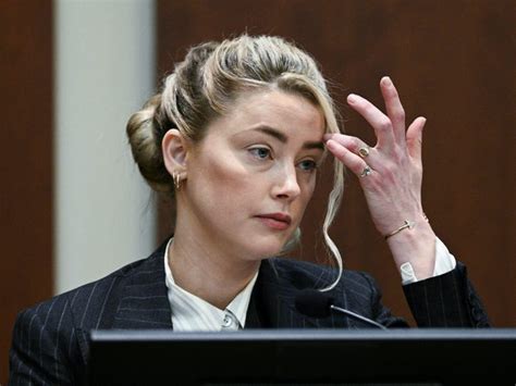 Photos Show Amber Heard Bruised After An Incident With Johnny Depp Former Friend Says