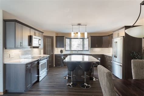 Cabinets are sold primarily through kitchen cabinet dealers and showrooms, home improvement centers, lumberyards, and some kitchen appliance stores. Tuxedo Shaker Style Kitchen - Cabinet Refacing