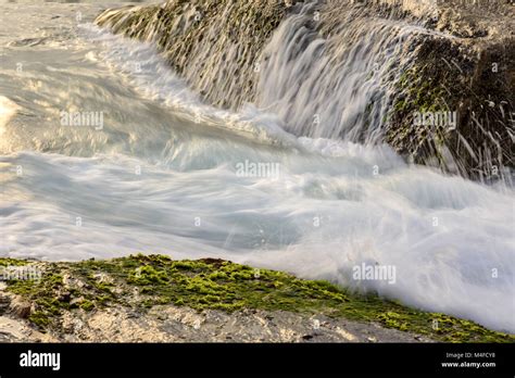 Water Dripping Between Rocks Stock Photo Alamy