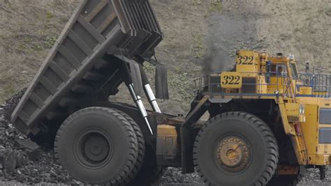 Mining Dump Trucks In The Open Pit Mine Heavy Truck In Coal Mine Stock