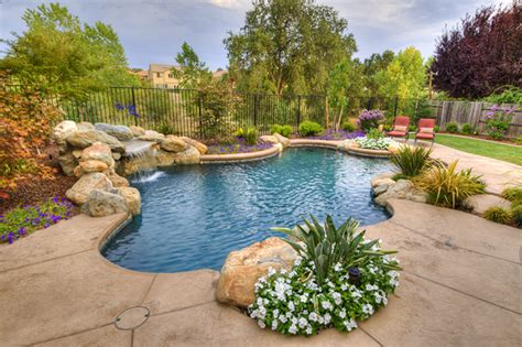 Need help finding the right pool waterfall? Pools with Waterfalls - Premier Pools & Spas