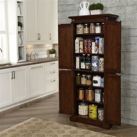Cherry wood kitchen pantry cabinet. Home Styles Americana Kitchen Pantry in Cherry - 5005-69