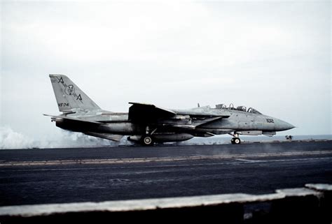 A Fighter Squadron 74 Vf 74 F 14a Tomcat Aircraft Rolls Down The No