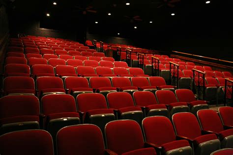 pin by lauren penizotto on joey red button seat squares theater seating movie theater movie