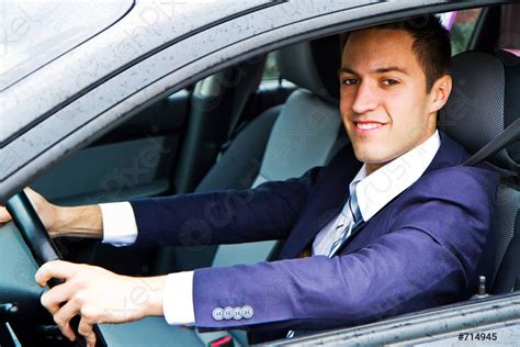 Portrait Of An Handsome Guy Driving His Car Stock Photo 714945