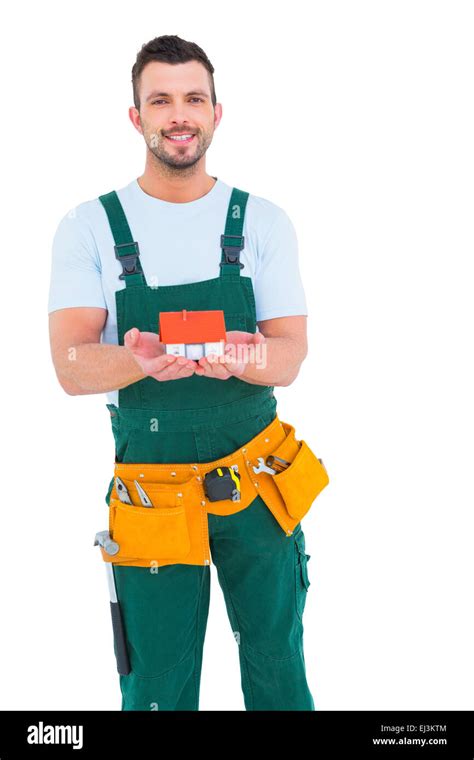 Happy Construction Worker Holding House Model Stock Photo Alamy