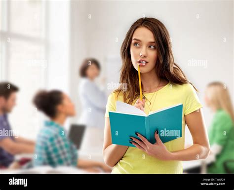 Teenage Student Girl With Notebook At School Stock Photo Alamy