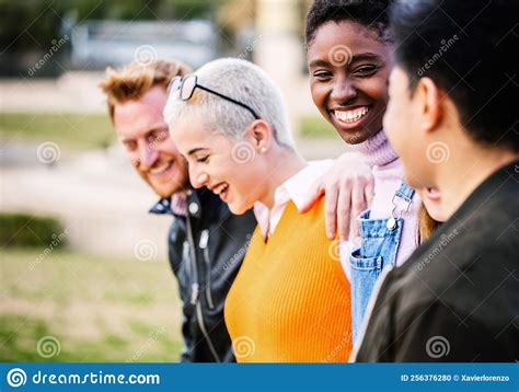 Diverse Group Of Young People Having Fun Together Outdoor Stock Photo
