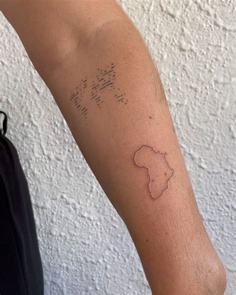 Minimalist Africa Map Tattoo On The Forearm