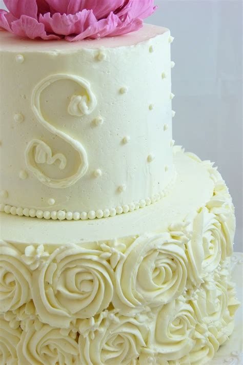 Buttercream Decorated Small Wedding Cake With Piped Roses Dots And A Monogram Handmade Gum Paste
