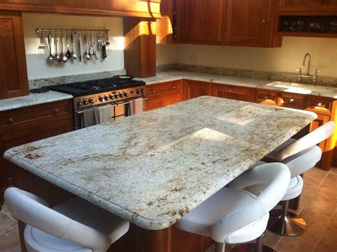 Beautiful Kitchen Island And Worktops In Colonial Gold Leathered