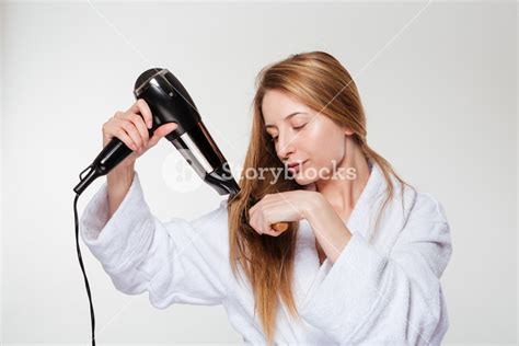 Young Woman Drying Her Hair Royalty Free Stock Image Storyblocks