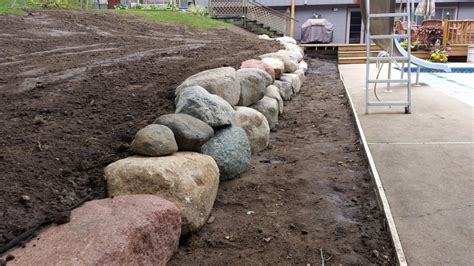 How to install natural stone retaining wall. Block, natural stone or boulder wall retaining walls | NS Landscapes