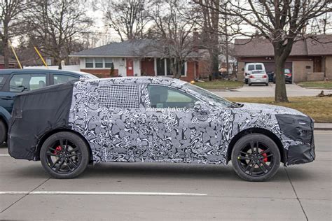 New ford mondeo evos spotted testing in heavy camouflage. 2022 Ford Fusion Evos Spied With Crosswagon Styling Cues ...