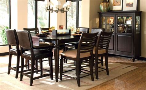 Featuring a rectangular table, two saddle stools, and a bench, this set offers space to seat four. Somerset Tall Table with Tall and Leather Tall Chairs ...