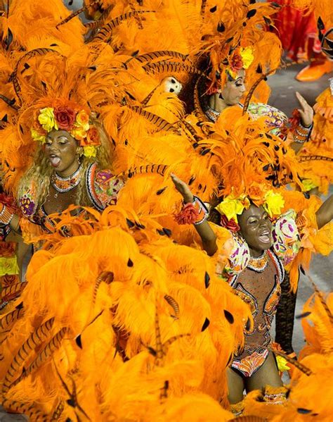 Samba Dancers In A Riot Of Orange Rio De Janeiro Carnival Sambodrome