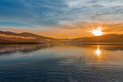 Orange Sunset Over Mountain Lake Stock Image Image Of Lake Island
