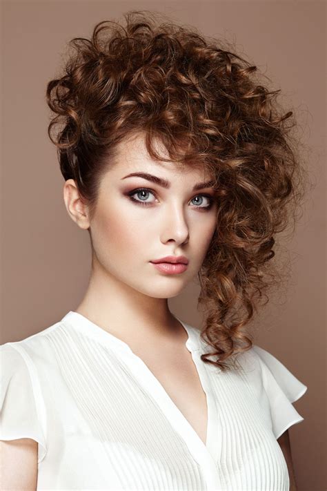 As curly hair doesn't grow straight or evenly from the root, it requires extra care and attention. Brunette woman with curly and shiny hair - Brunette woman ...