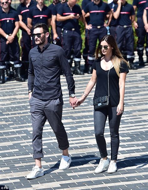tottenham s goalkeeper hugo lloris and wife arrive nice to pay respects to the victims of the