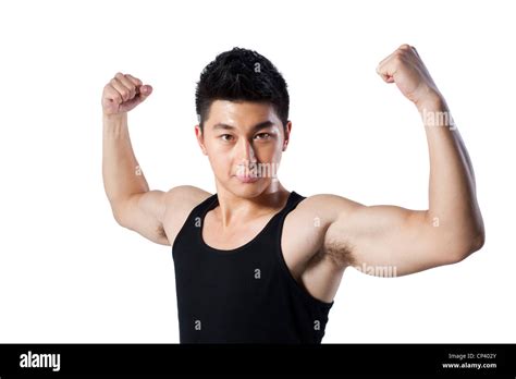 Man Flexing His Muscles Stock Photo Alamy