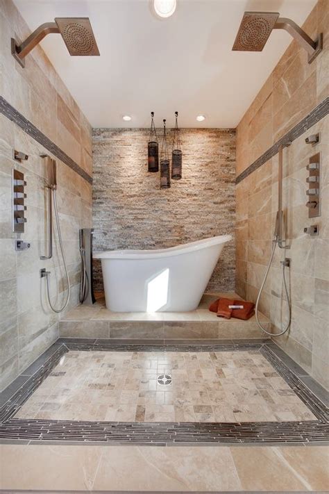 master bathroom  limestone tile floors dual shower