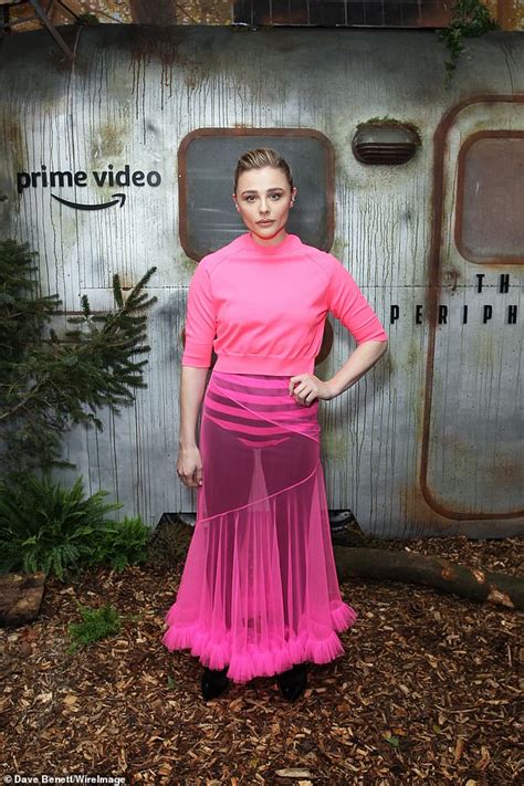 Chloe Grace Moretz Catches The Eye In Bold Pink Jumper And Sheer Tulle