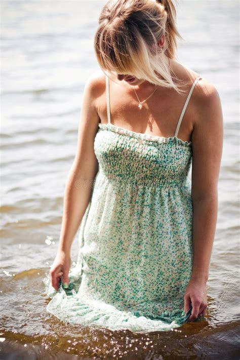 woman getting her dress wet stock image image of dress glamour 13128453
