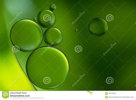 Green Drops Of Oil And Air Bubbles On The Water Stock Image Image Of