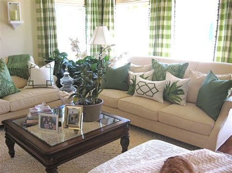 With a neutral backdrop—as well as the occasional pops of green and blue—this living room is both elegant and eclectic. Neutrals with green. | Living room green, Beige living rooms, French country living room