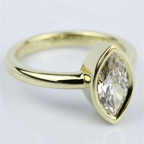 Bezel Set Marquise Diamond Ring In Yellow Gold 1 Carat