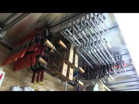 Finally, i located a stud in the wall and hung my diy clamp rack up. AWESOME ROLLING TOOL BOX: CLAMP STORAGE -#ronpaulk #woodworking #carpentry #tools #workbench # ...