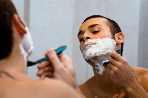 Shave slowly in short, steady strokes in the direction of the hair growth to prevent skin irritation. Clean Shaven: Why It's Time to Get Rid of Your Facial Hair